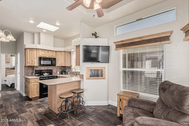a view of a brick house with a large window