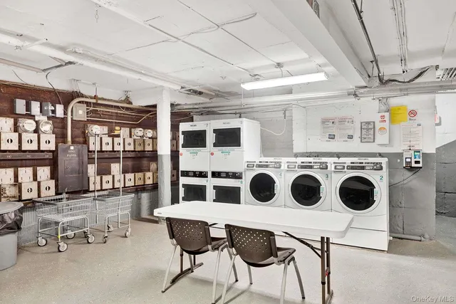 a view of a kitchen with a dining table chairs and a fireplace