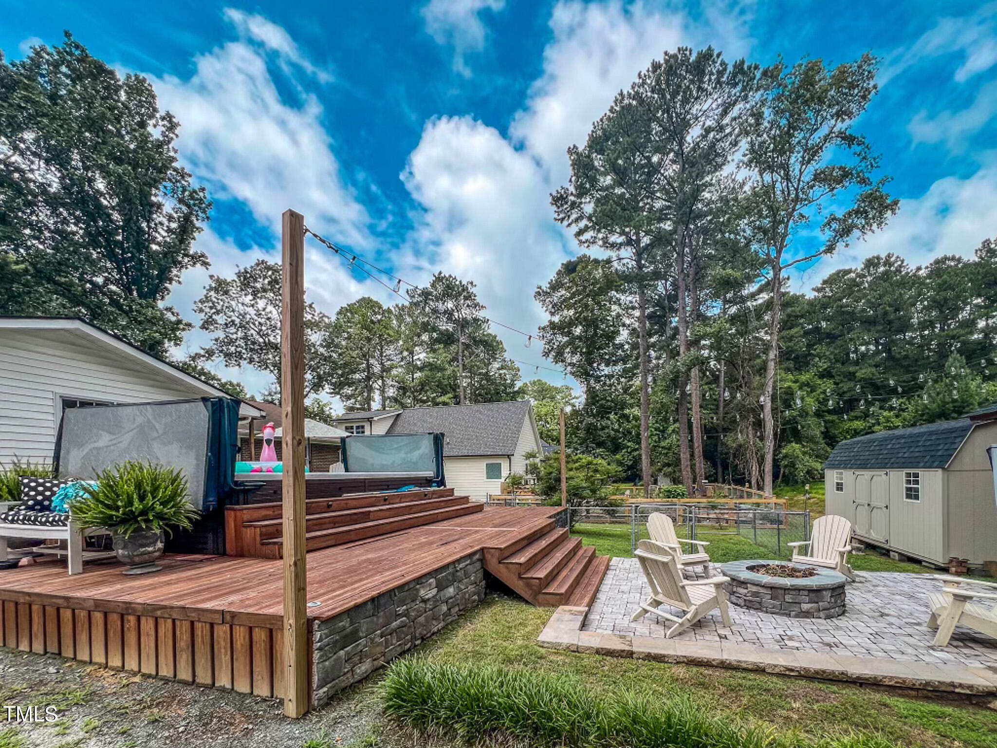 1804 Grady Drive Durham, NC 27712 - Photo 12 of 43 a view of a house with backyard and sitting area