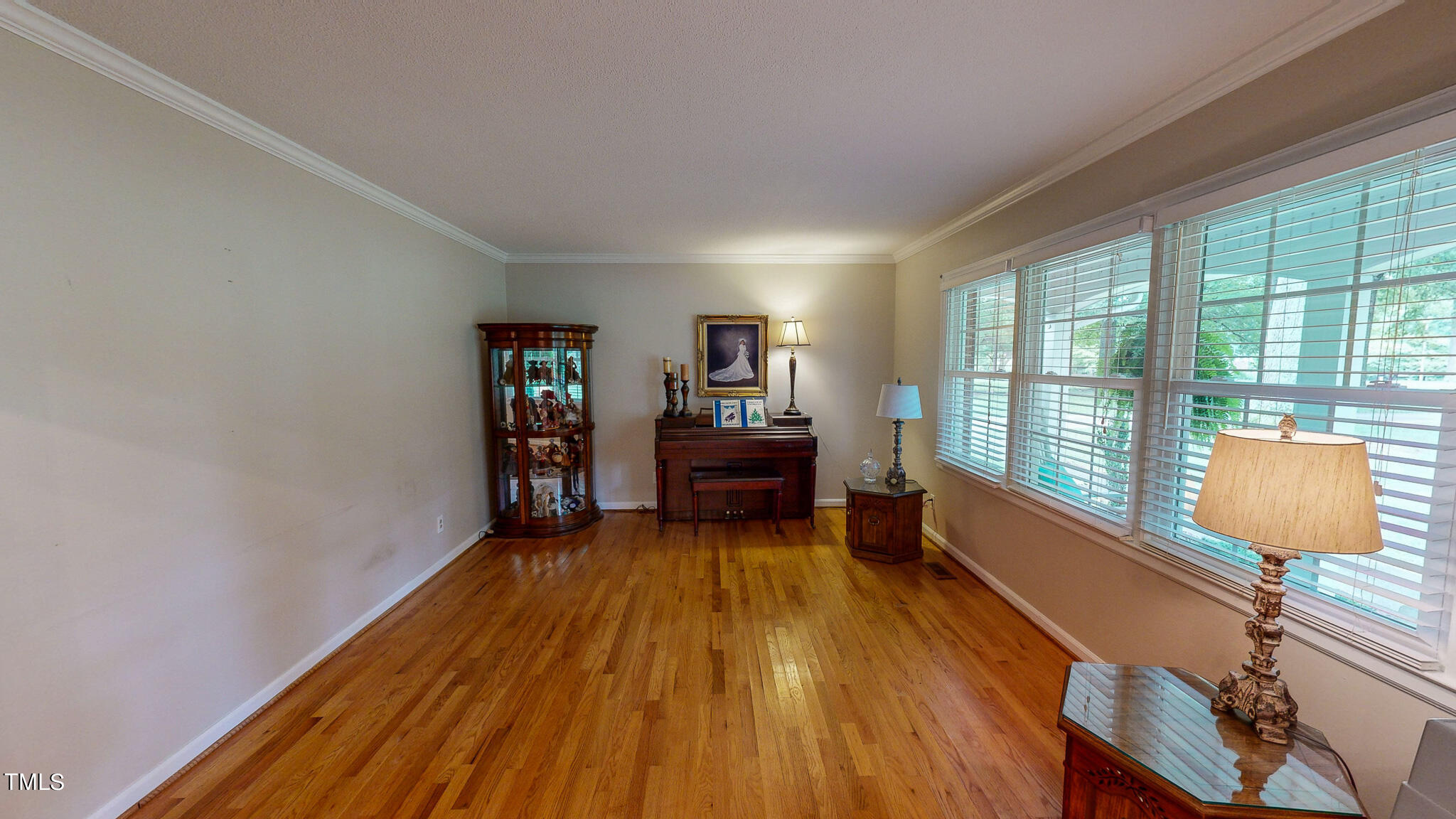 1804 Grady Drive Durham, NC 27712 - Photo 29 of 43 a living room with furniture and a wooden floor