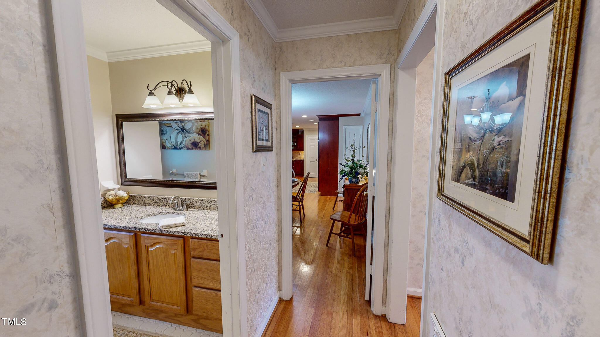 1804 Grady Drive Durham, NC 27712 - Photo 34 of 43 a view of hallway with wooden floor and cabinet