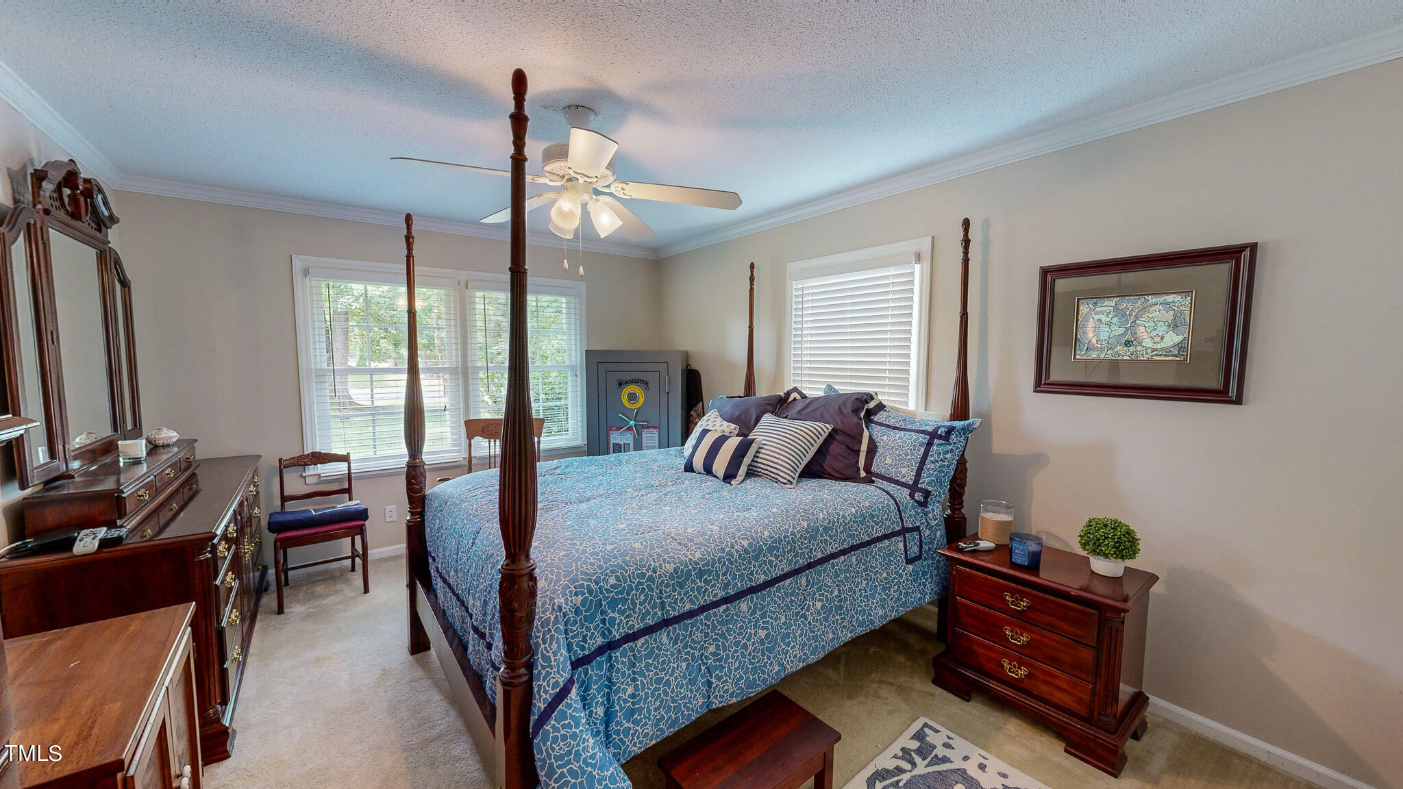1804 Grady Drive Durham, NC 27712 - Photo 35 of 43 a bed room with a bed and a dresser