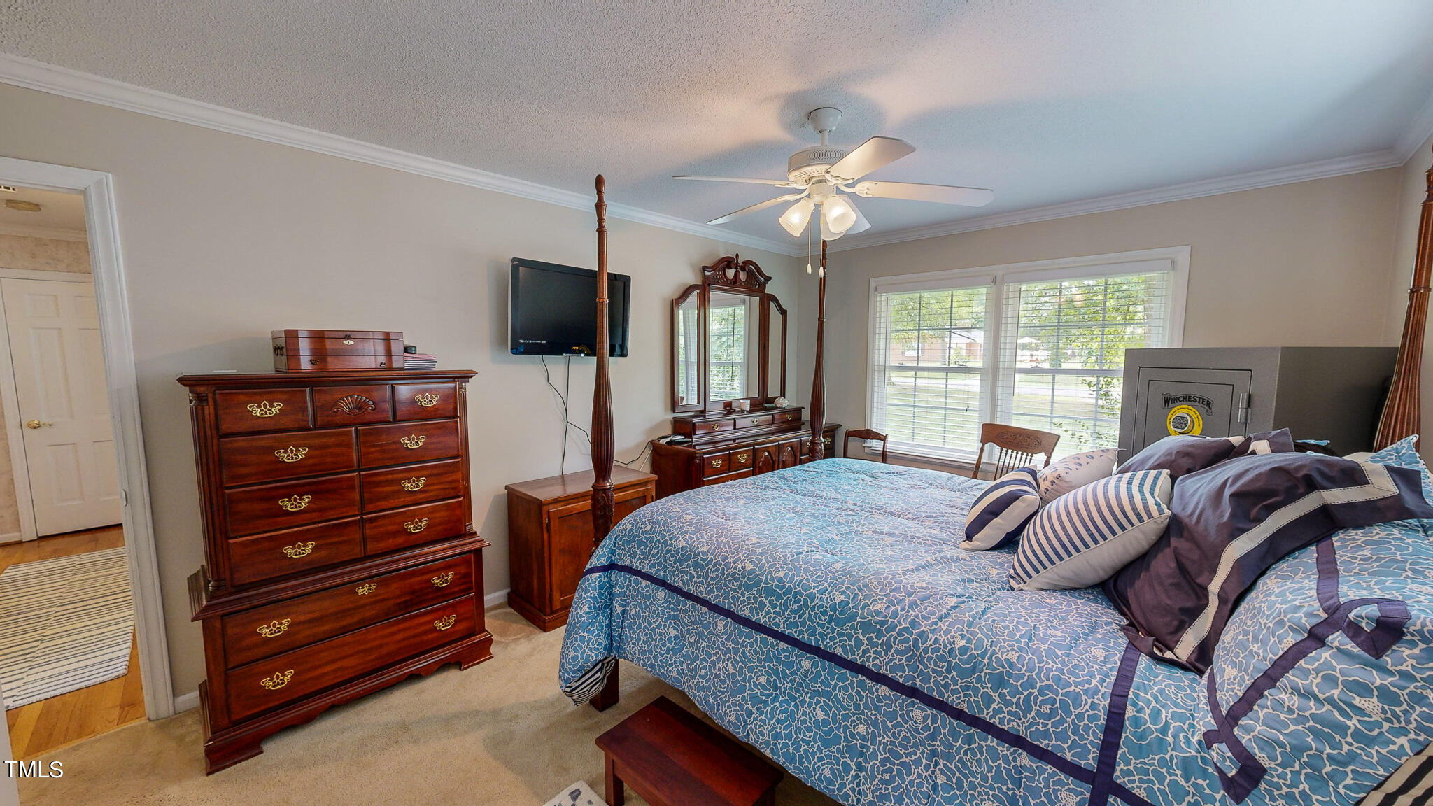 1804 Grady Drive Durham, NC 27712 - Photo 36 of 43 a bed room with a bed and a television