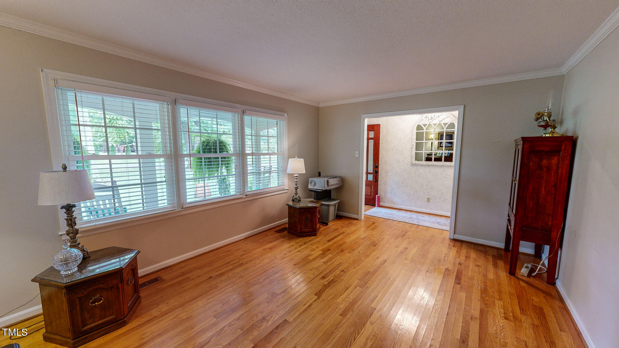 1804 Grady Drive Durham, NC 27712 - Photo 8 of 43 a room with window and wooden floor