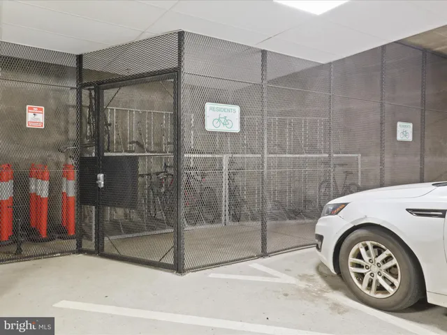 a bathroom with a shower and a sink