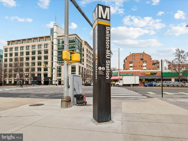 a view of a red and white kitchen with red and white board
