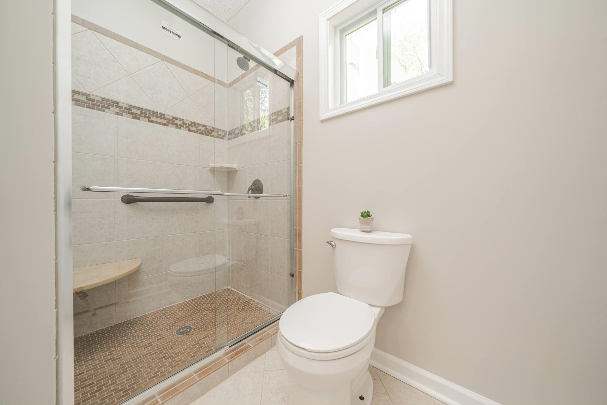 3513 Kensett Way Raleigh, NC 27616 - Photo 13 of 32 Large Walk-in Shower with Tile Surround