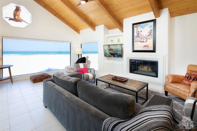 4025 Ocean Drive Oxnard, CA 93035 - Photo 18 of 31 a living room with furniture and a fireplace