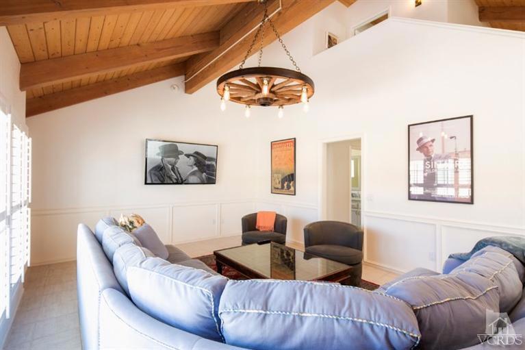 4025 Ocean Drive Oxnard, CA 93035 - Photo 26 of 31 a living room with furniture and a large window