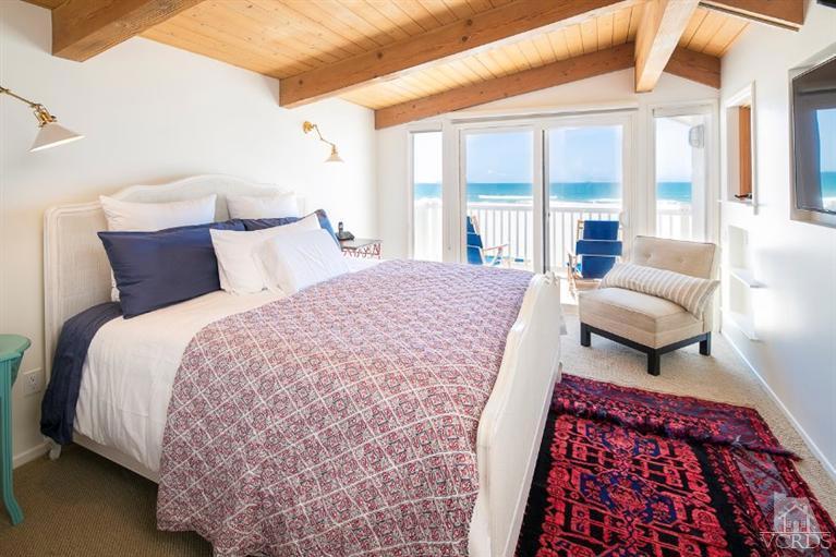 4025 Ocean Drive Oxnard, CA 93035 - Photo 30 of 31 a bedroom with a bed and a couch