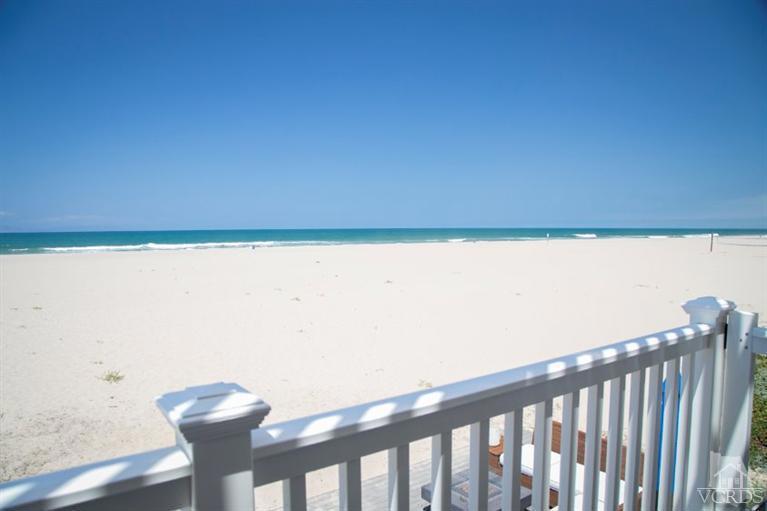 4025 Ocean Drive Oxnard, CA 93035 - Photo 3 of 31 a view of a room with wooden floor and chair