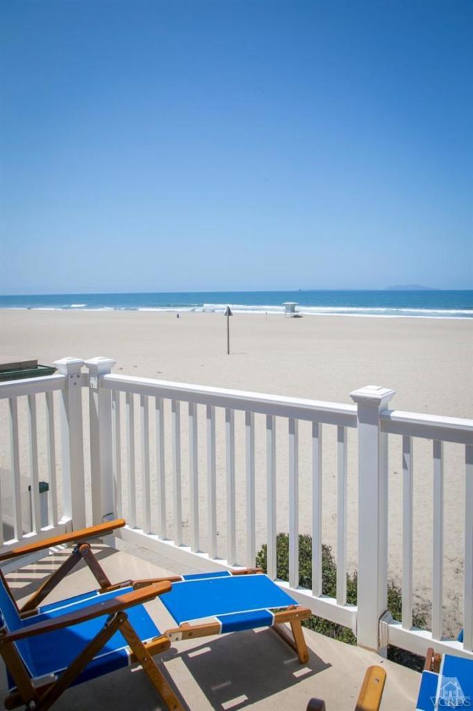 4025 Ocean Drive Oxnard, CA 93035 - Photo 9 of 31 a room with furniture a rug and a window