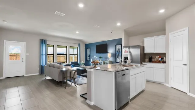 a kitchen with a stove and a microwave