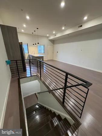 a view of hallway with washer and dryer