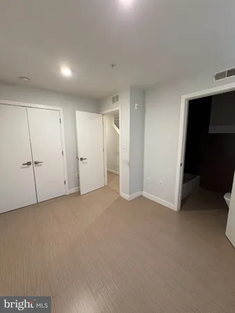 a bathroom with a sink a toilet and bathtub