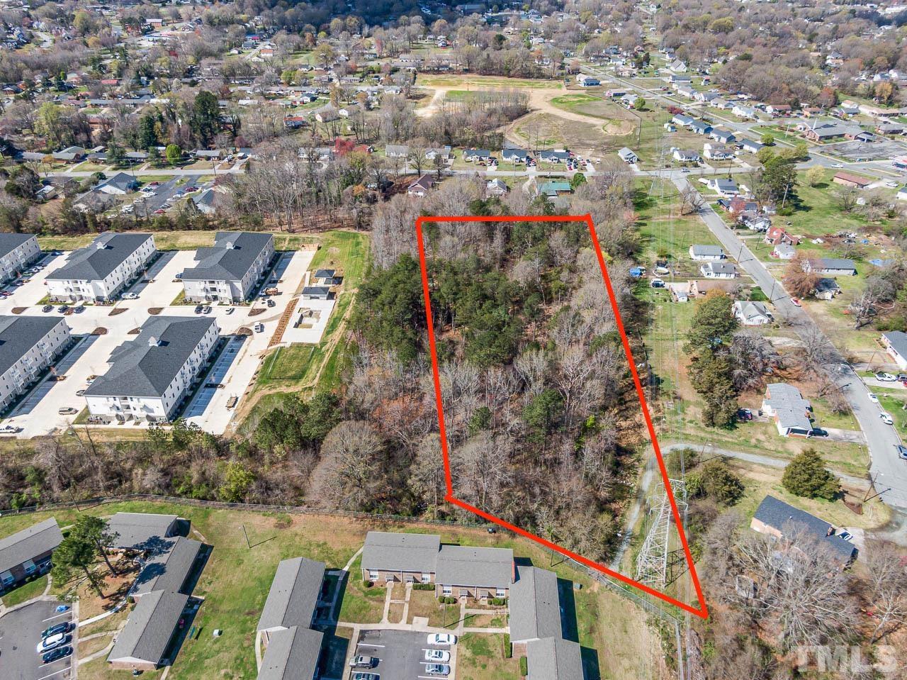 0 Baldwin Road Burlington, NC 27217 - Photo 5 of 10 an aerial view of residential houses with outdoor space