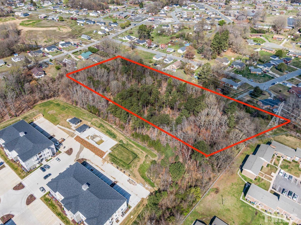 0 Baldwin Road Burlington, NC 27217 - Photo 6 of 10 an aerial view of residential houses with outdoor space