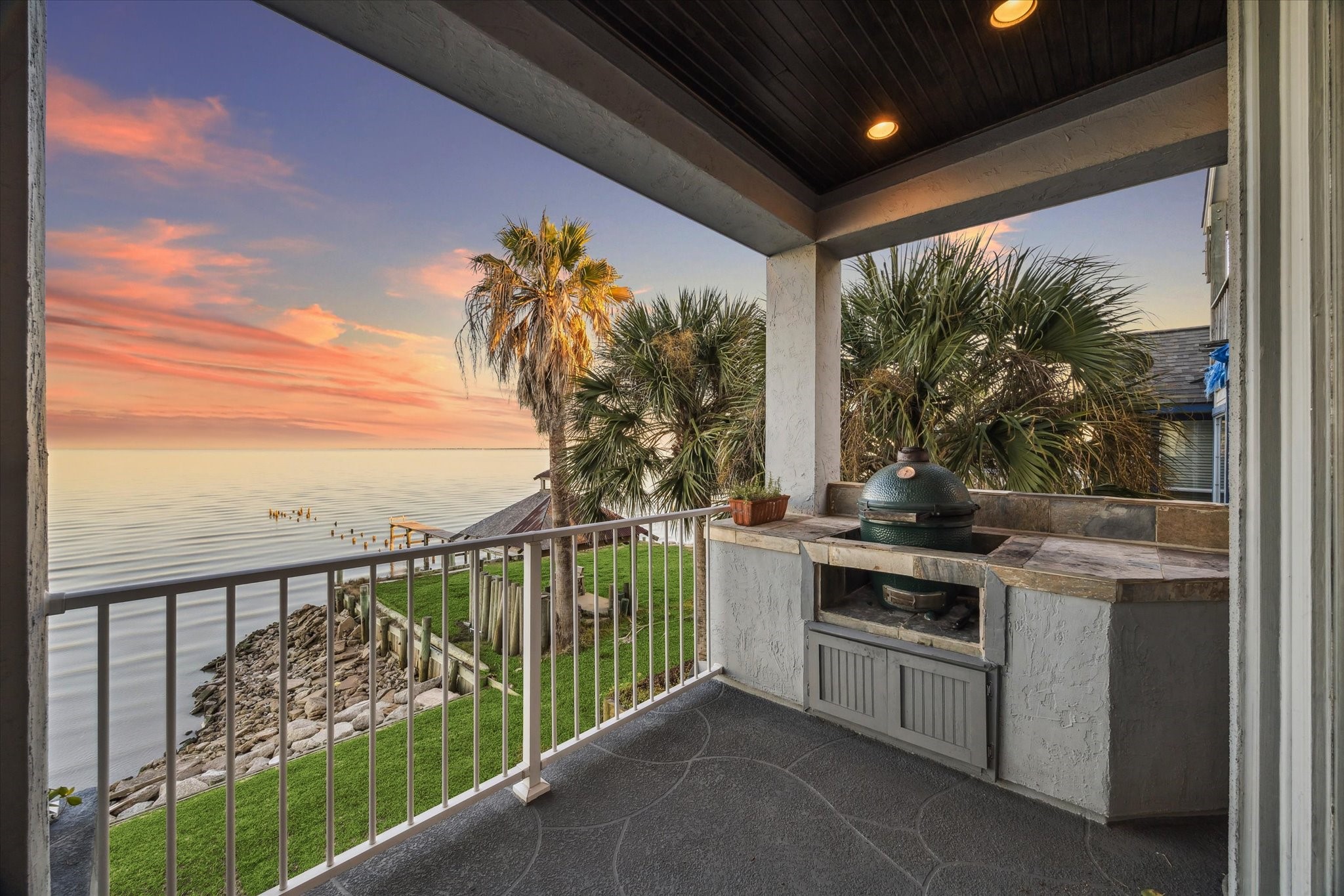 1406 Todville Road Seabrook, TX 77586 - Photo 19 of 50 THE BALCONY ALSO OFFERS A BUILT-IN COOKING NICHE WHICH IS PERFECT FOR A SMOKER.