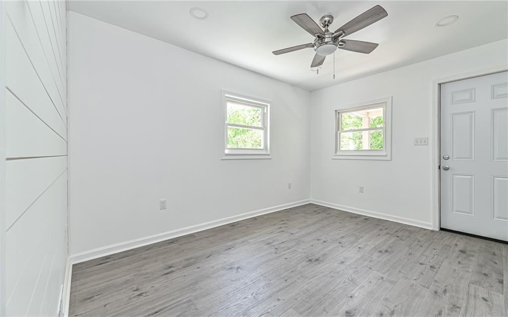 46 Winchell Street Pittsburgh, PA 15215 - Photo 3 of 18 Living room features recessed lighting and ceiling fan with overhead lighting.