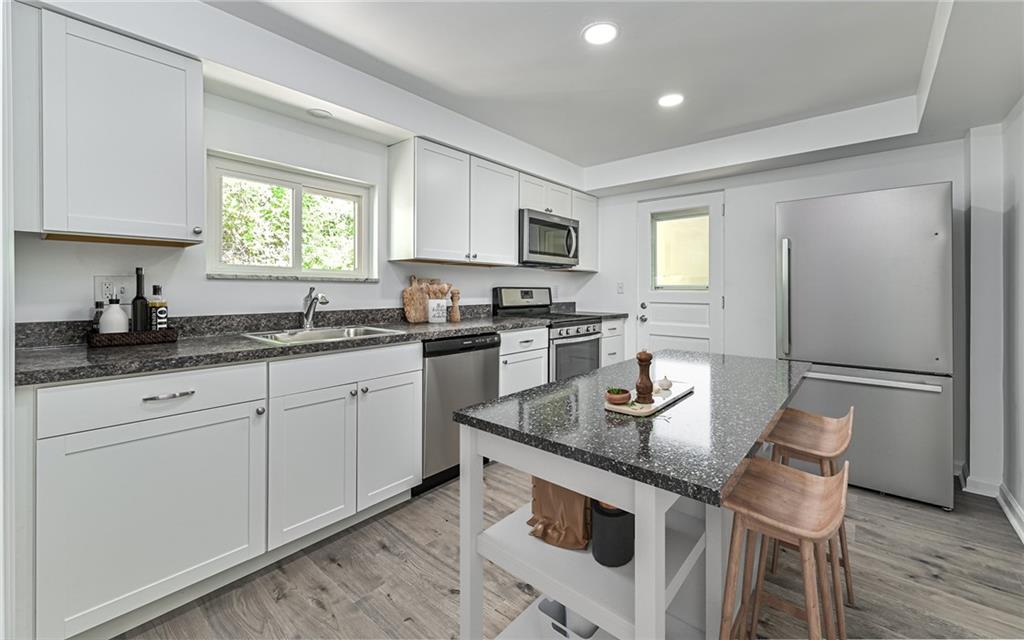 46 Winchell Street Pittsburgh, PA 15215 - Photo 5 of 18 You can easily add a center island in kitchen for bar stool seating.