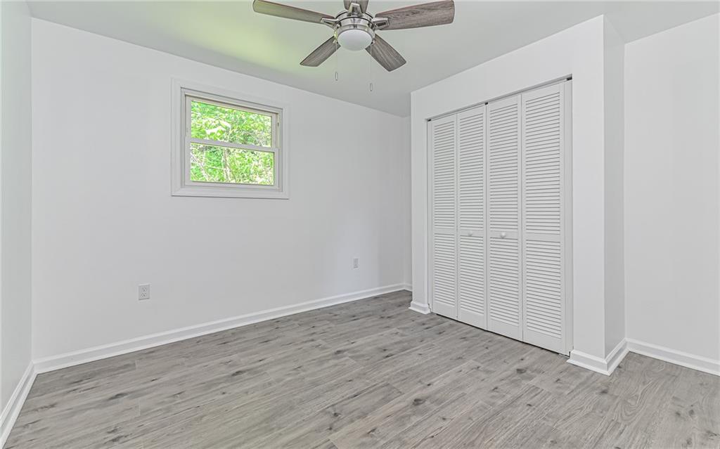 46 Winchell Street Pittsburgh, PA 15215 - Photo 10 of 18 Master bedroom with ceiling fan and overhead lighting.