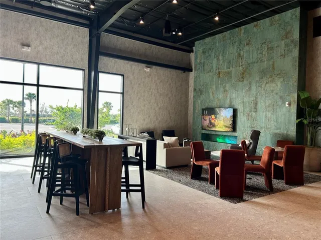 a outdoor space with lots of tables and chairs