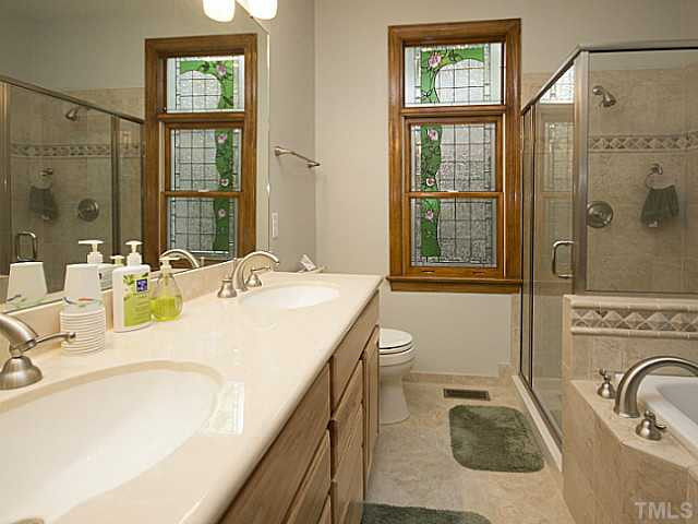 5116 Carter Street Raleigh, NC 27612 - Photo 8 of 25 First floor master bath -double vanity, giant shower, and garden tub...more like a master spa! Other