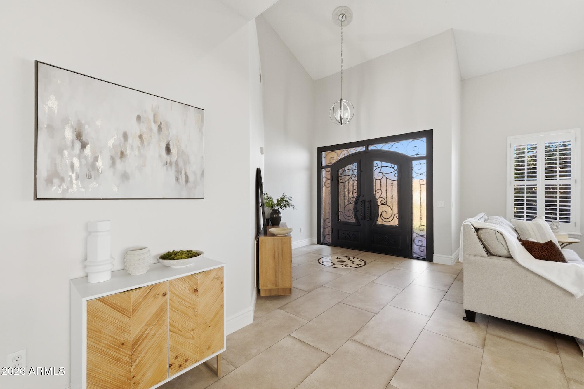 3425 East Mockingbird Drive Gilbert, AZ 85234 - Photo 11 of 52 a living room with furniture and window