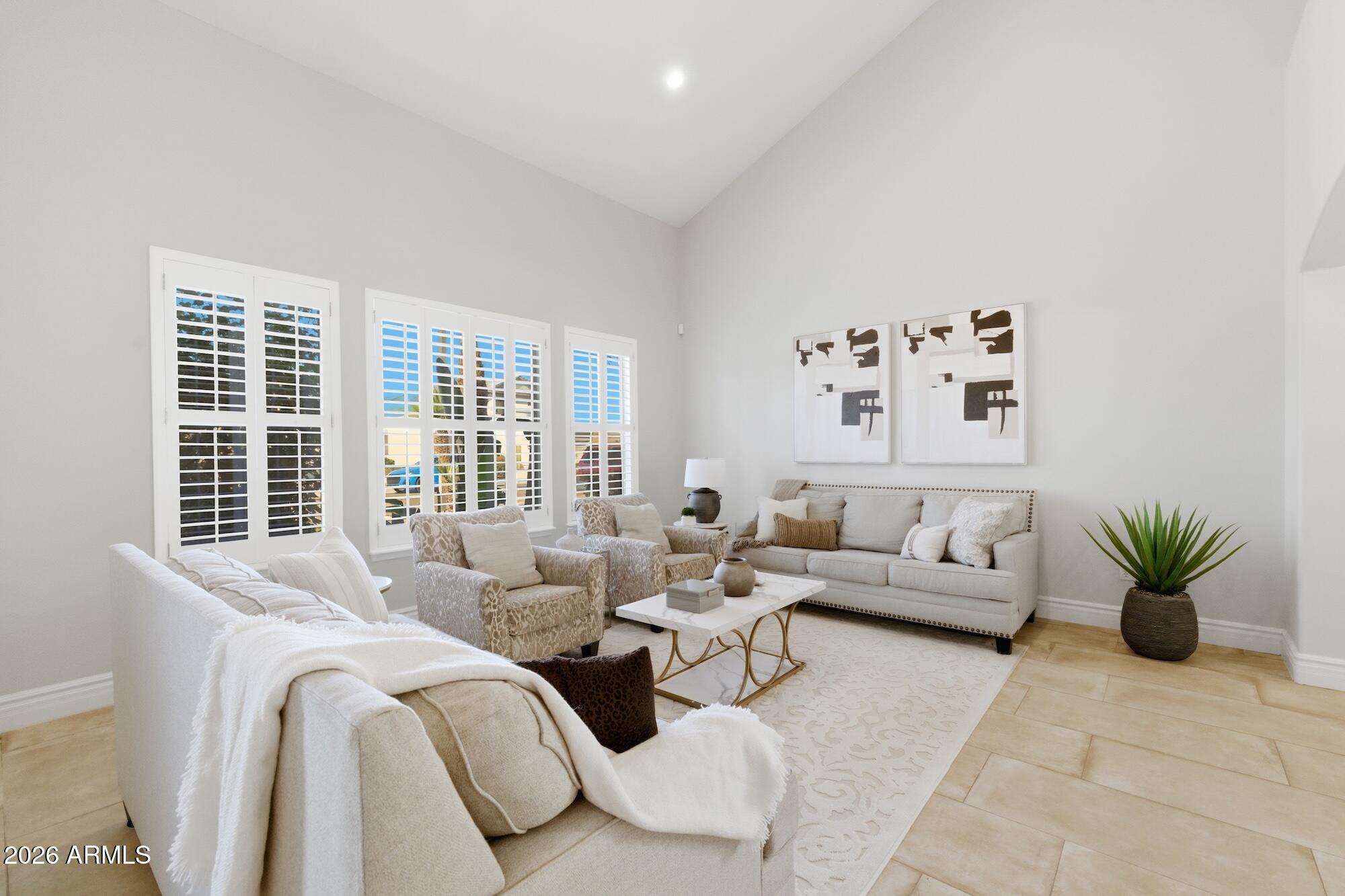 3425 East Mockingbird Drive Gilbert, AZ 85234 - Photo 12 of 52 a living room with furniture and window