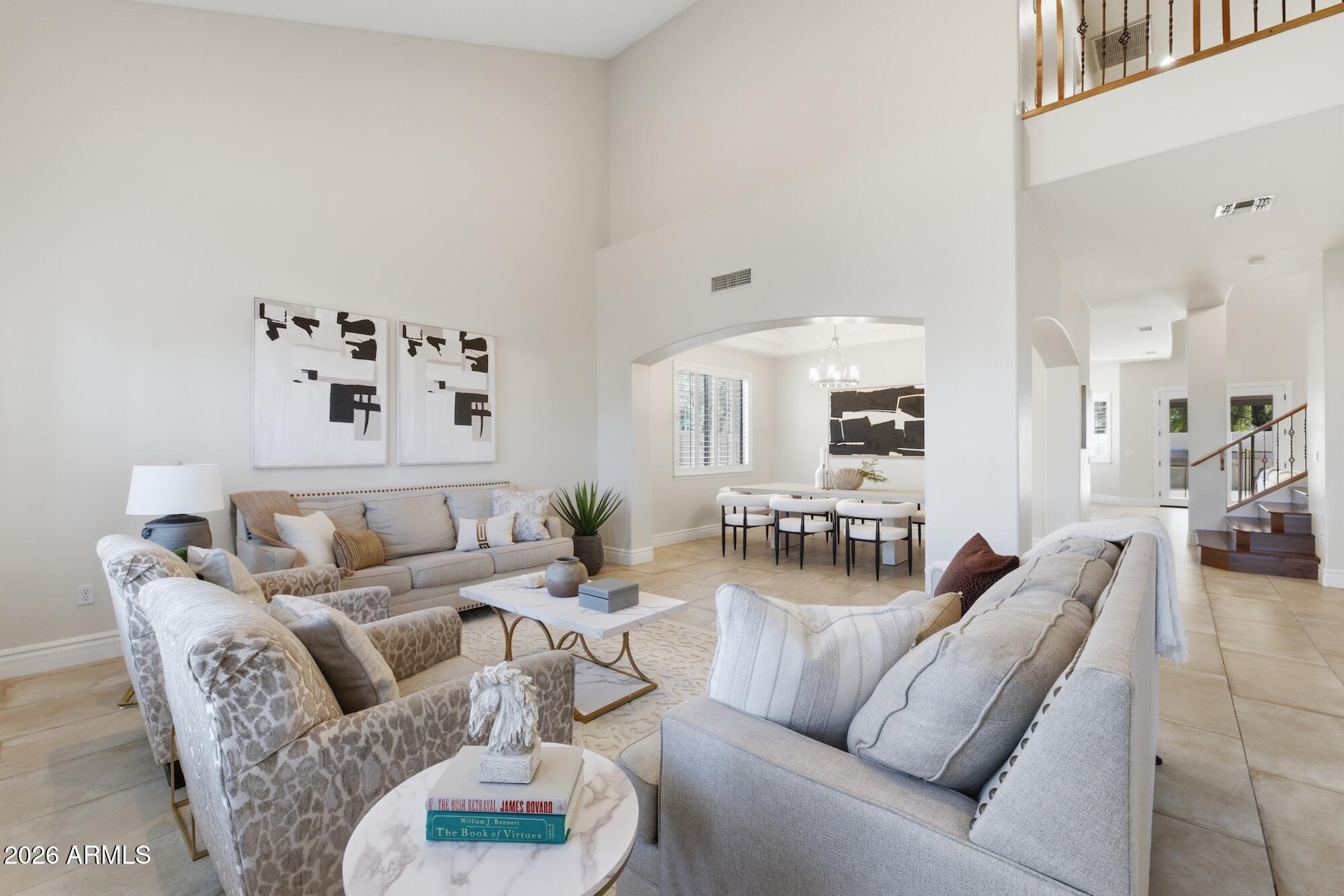 3425 East Mockingbird Drive Gilbert, AZ 85234 - Photo 13 of 52 a living room with furniture and wooden floor