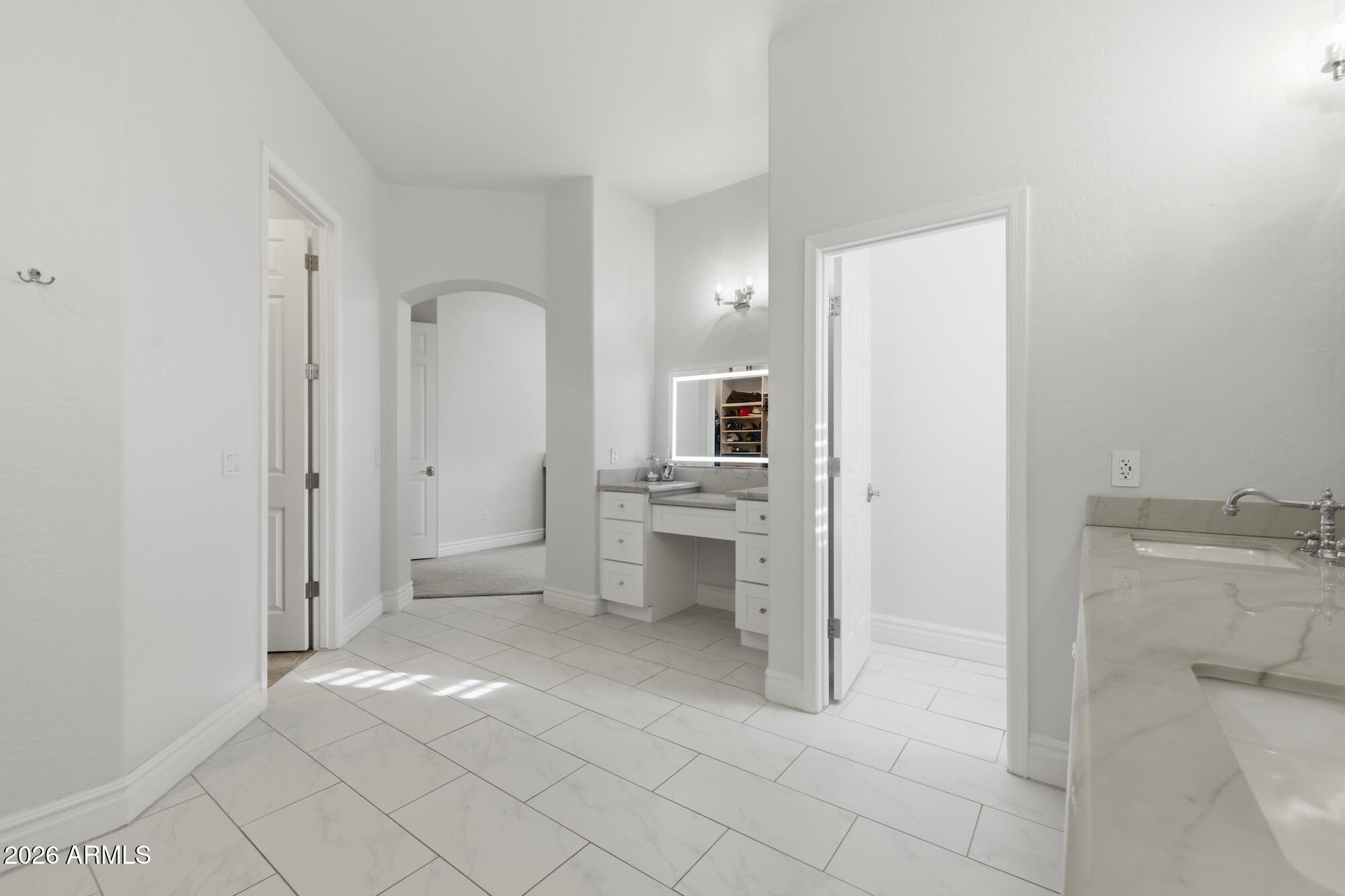 3425 East Mockingbird Drive Gilbert, AZ 85234 - Photo 26 of 52 a bathroom with a sink and mirror