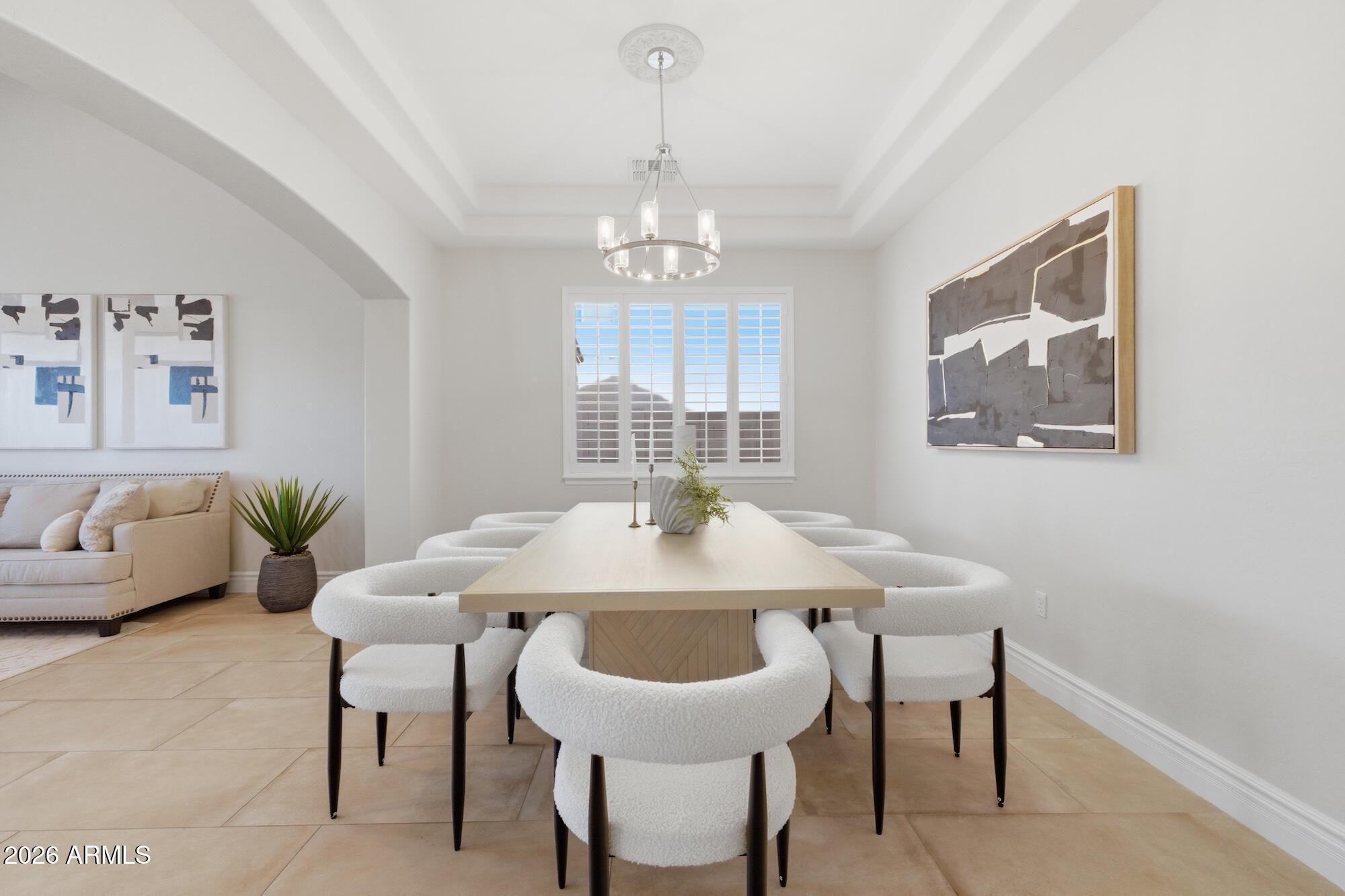 3425 East Mockingbird Drive Gilbert, AZ 85234 - Photo 3 of 52 a view of a dining room with furniture window and outside view