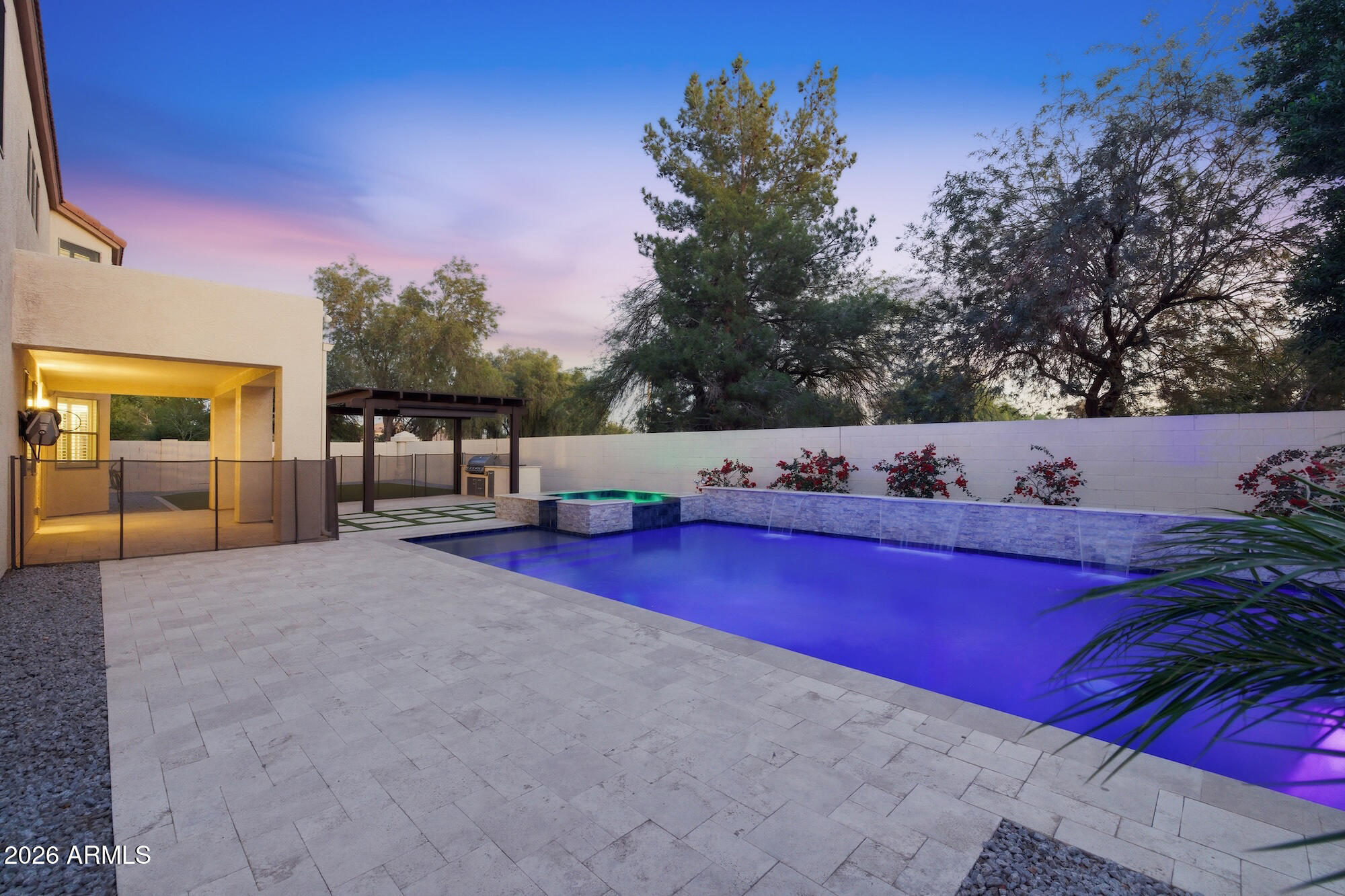 3425 East Mockingbird Drive Gilbert, AZ 85234 - Photo 5 of 52 a view of a living room with furniture and a potted plant