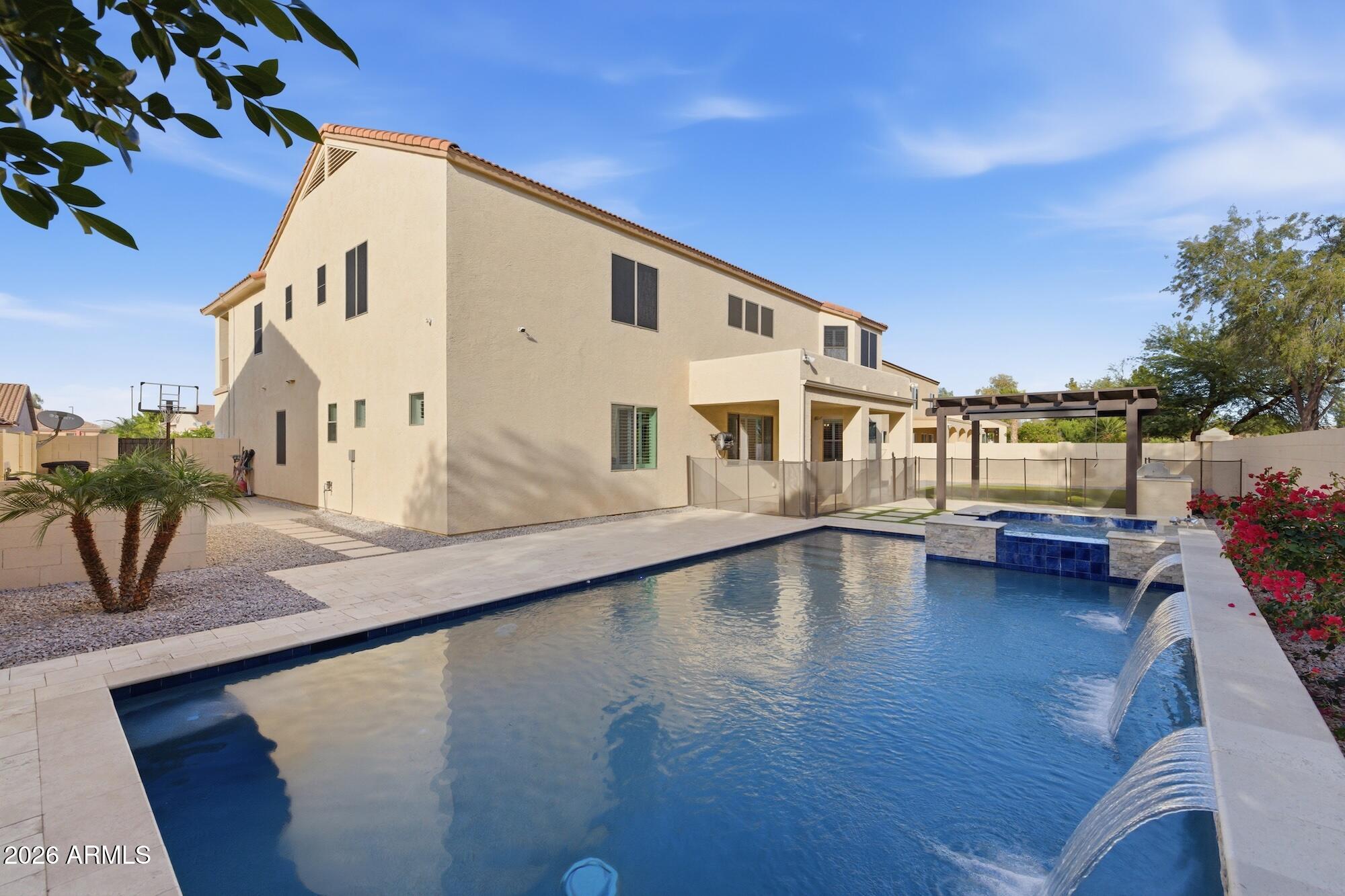 3425 East Mockingbird Drive Gilbert, AZ 85234 - Photo 51 of 52 a view of pool with outdoor seating