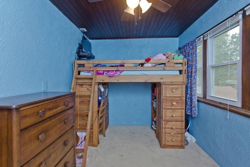 180 Granby Road Chicopee, MA 01013 - Photo 17 of 30 a bed room with a bed and a window