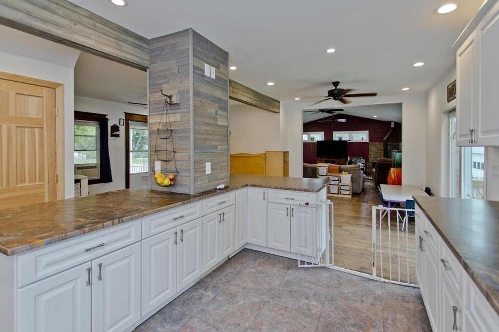 180 Granby Road Chicopee, MA 01013 - Photo 7 of 30 a kitchen with sink and cabinets