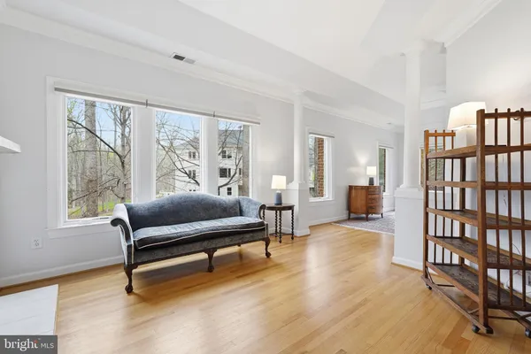 a bathroom with a toilet sink and shower