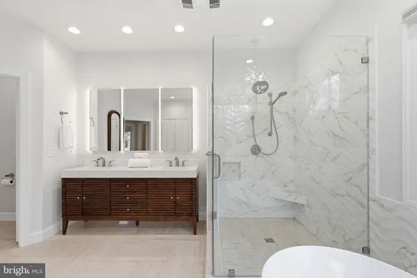 a view of a hallway with washer and dryer