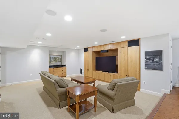 a front view of a house with a yard and balcony