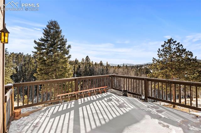 371 Rangeview Road Divide, CO 80814 - Photo 33 of 34 Back Deck Where the Sun Sets!