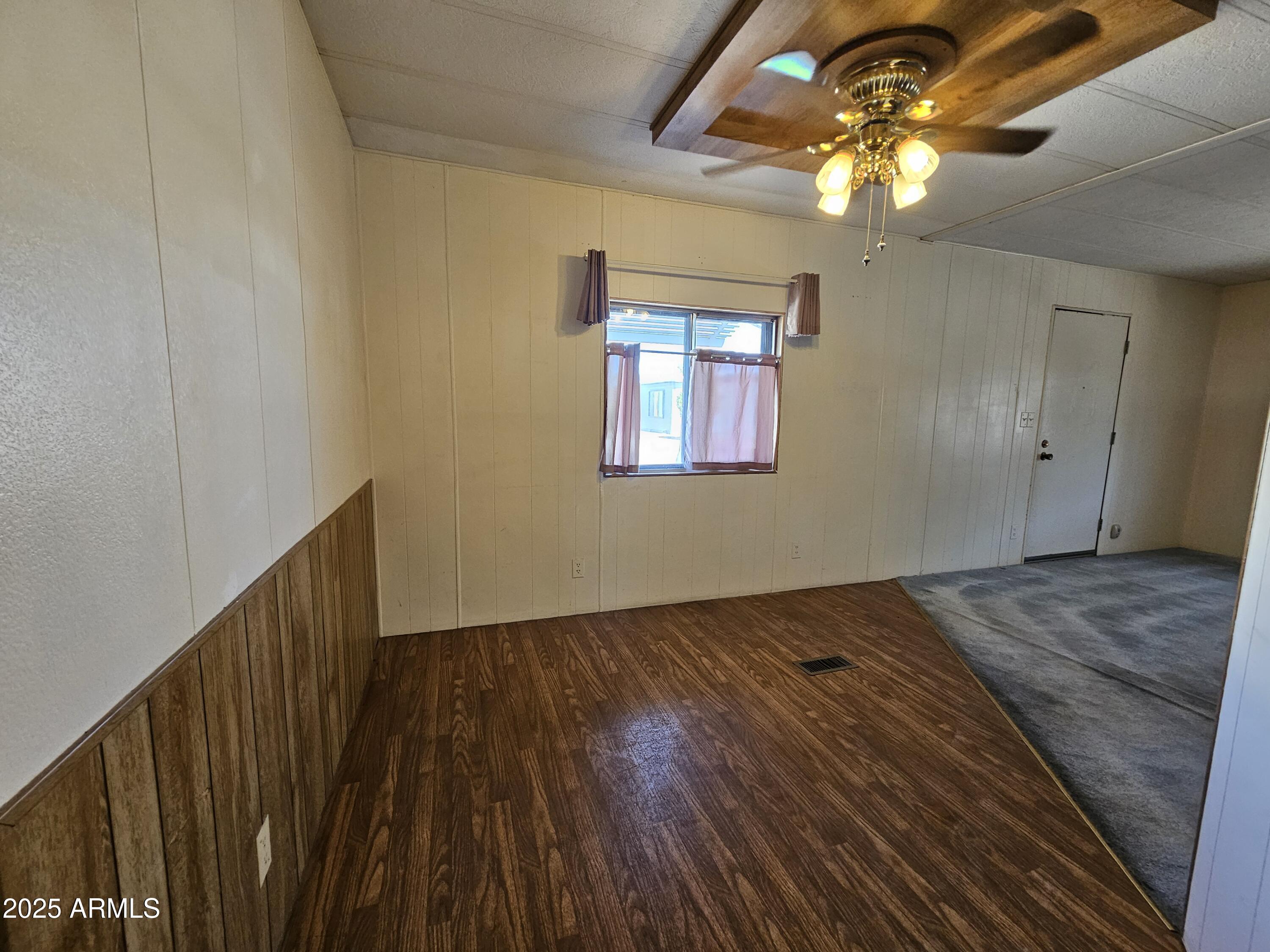 200 East Ivanhoe Street, Unit 60 Chandler, AZ 85225 - Photo 4 of 10 a view of an entryway with wooden floor