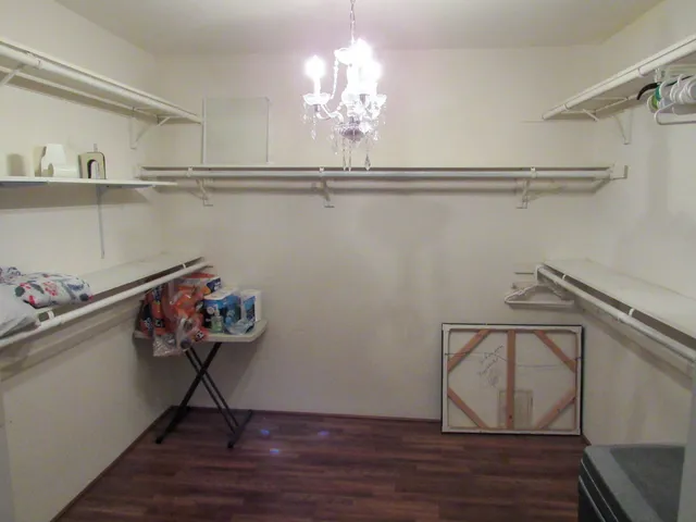 a view of a room with racks on the wall