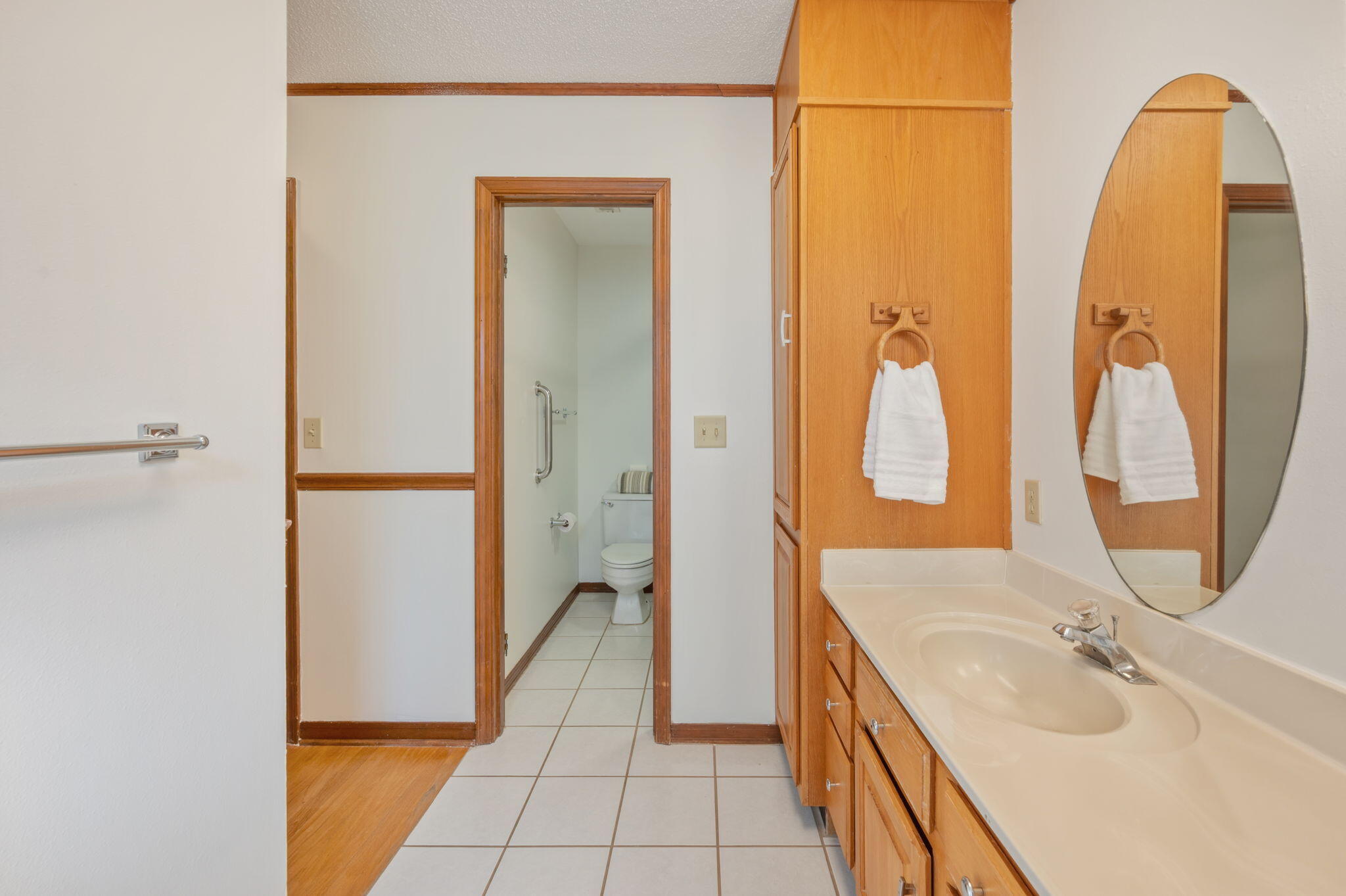 4841 Antioch Road Crestview, FL 32536 - Photo 27 of 70 a bathroom with a granite countertop sink and a mirror