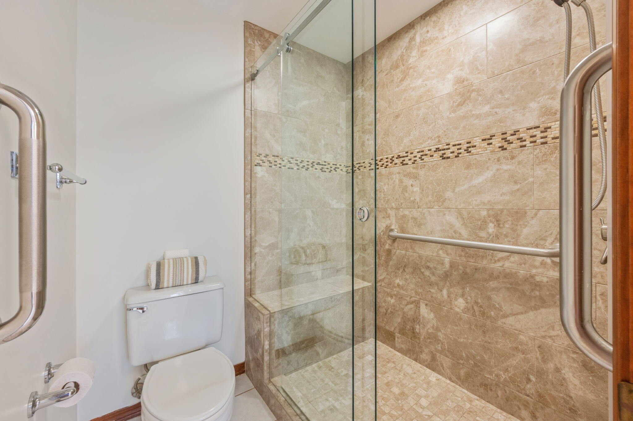 4841 Antioch Road Crestview, FL 32536 - Photo 28 of 70 a bathroom with a toilet and a shower