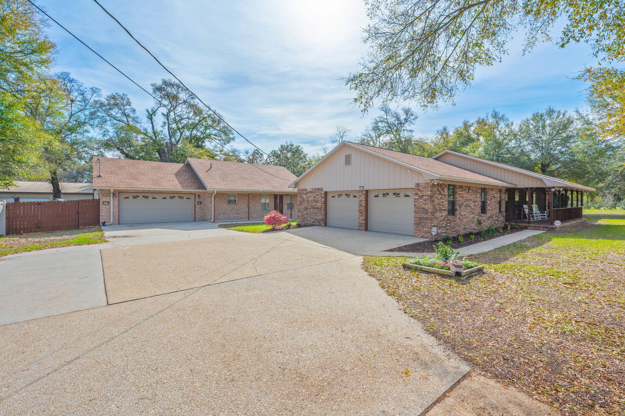 4841 Antioch Road Crestview, FL 32536 - Photo 3 of 70 a house with trees in the background