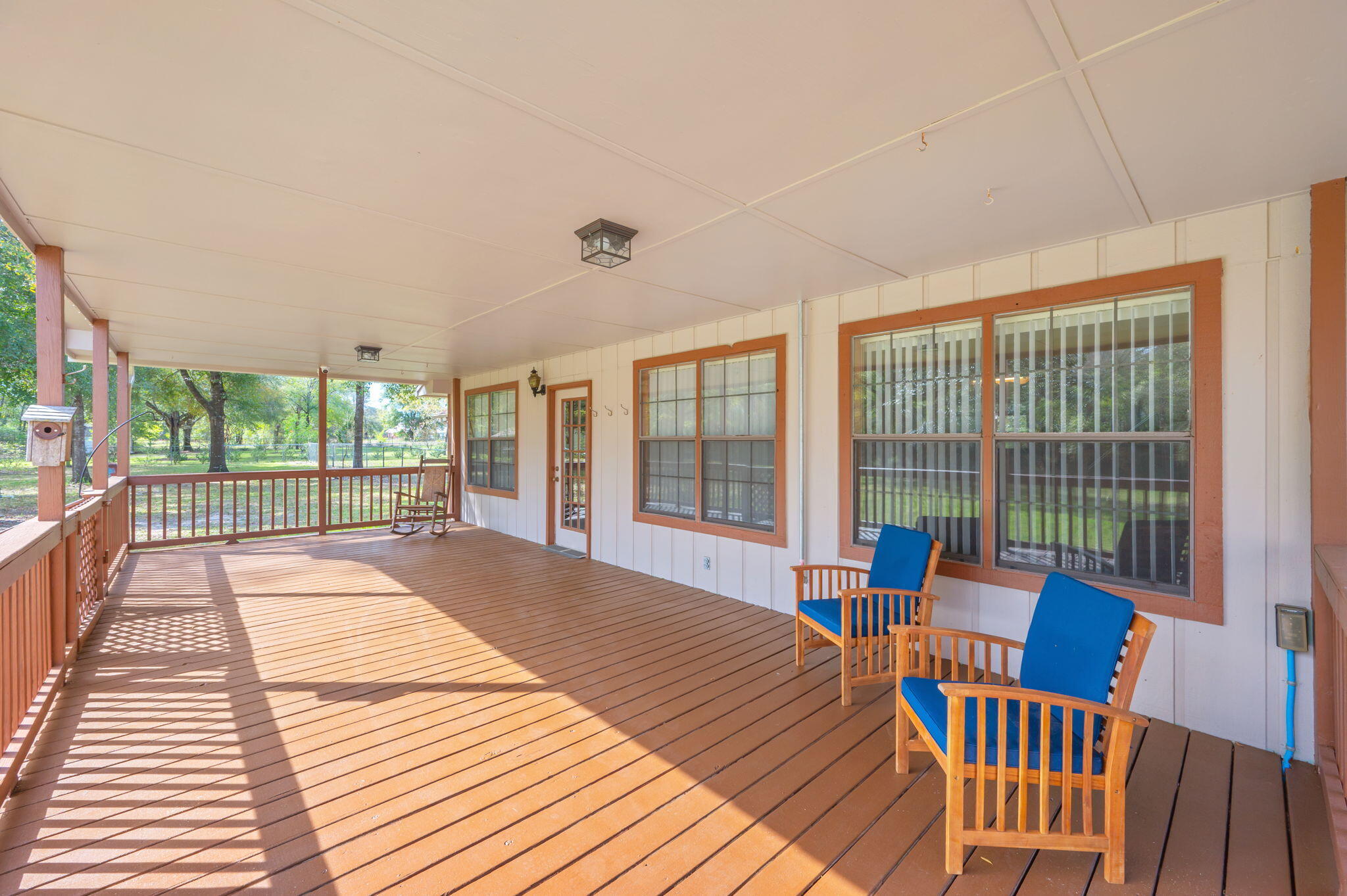 4841 Antioch Road Crestview, FL 32536 - Photo 44 of 70 a view of a room with wooden floor and furniture