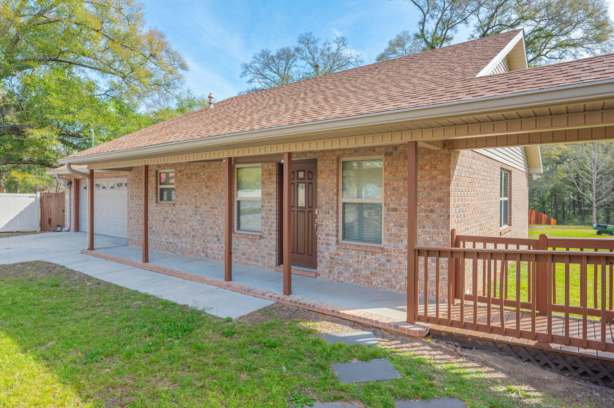4841 Antioch Road Crestview, FL 32536 - Photo 46 of 70 a view of a house with backyard and porch