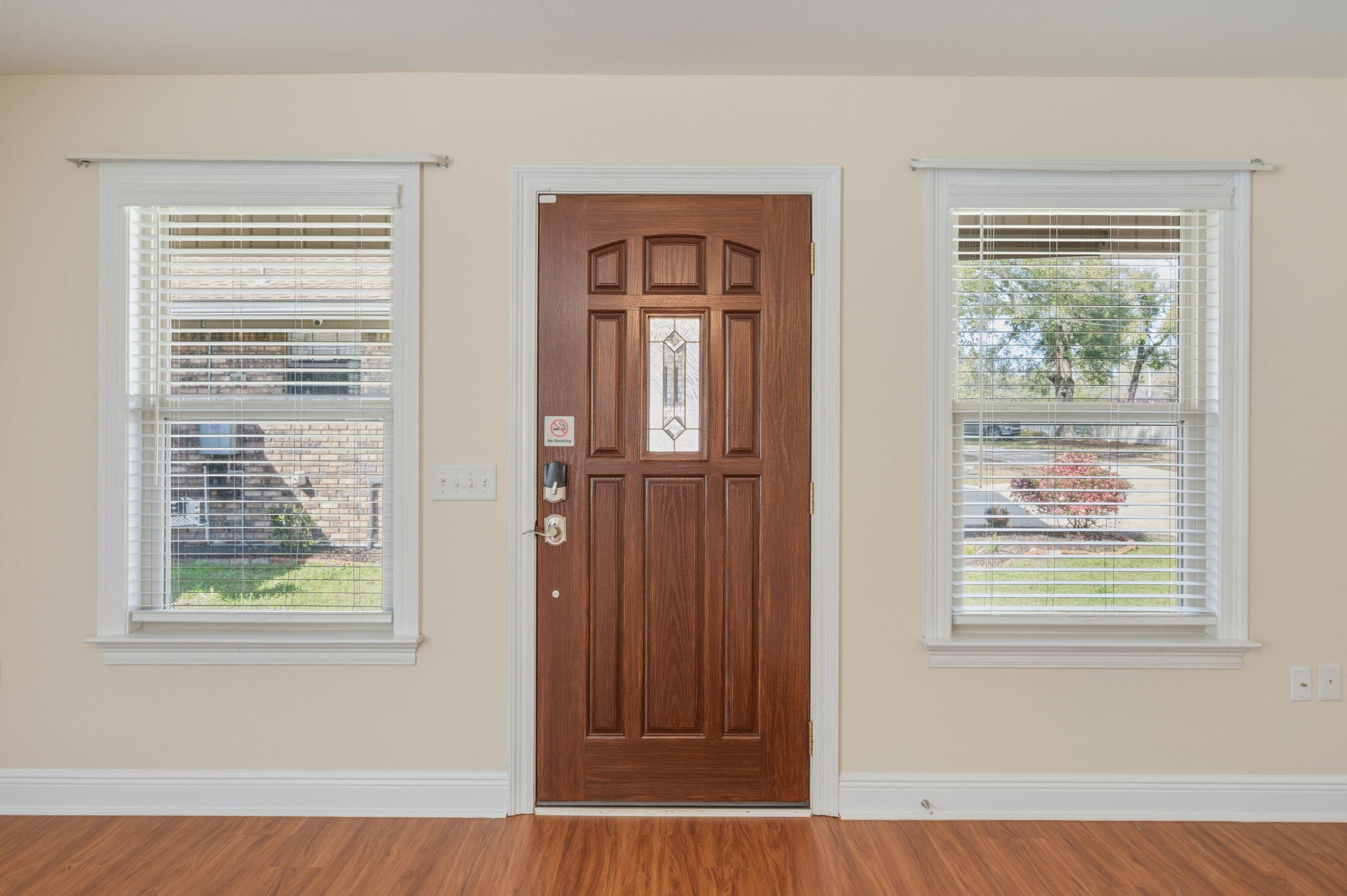 4841 Antioch Road Crestview, FL 32536 - Photo 48 of 70 a view of an entryway with wooden floor and windows