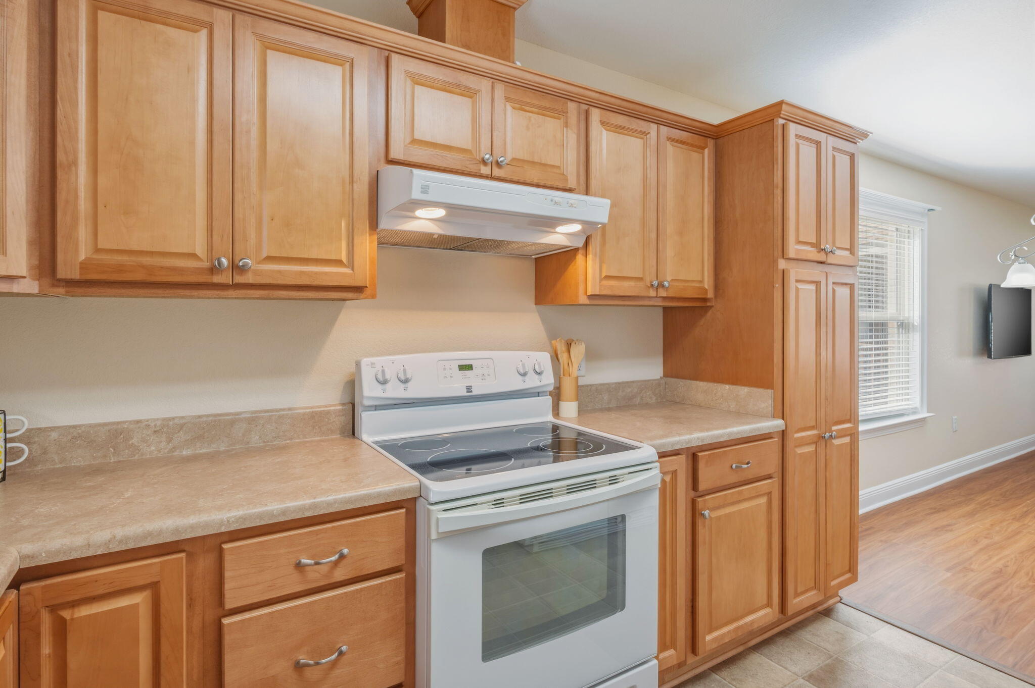 4841 Antioch Road Crestview, FL 32536 - Photo 56 of 70 a kitchen with a stove and a refrigerator