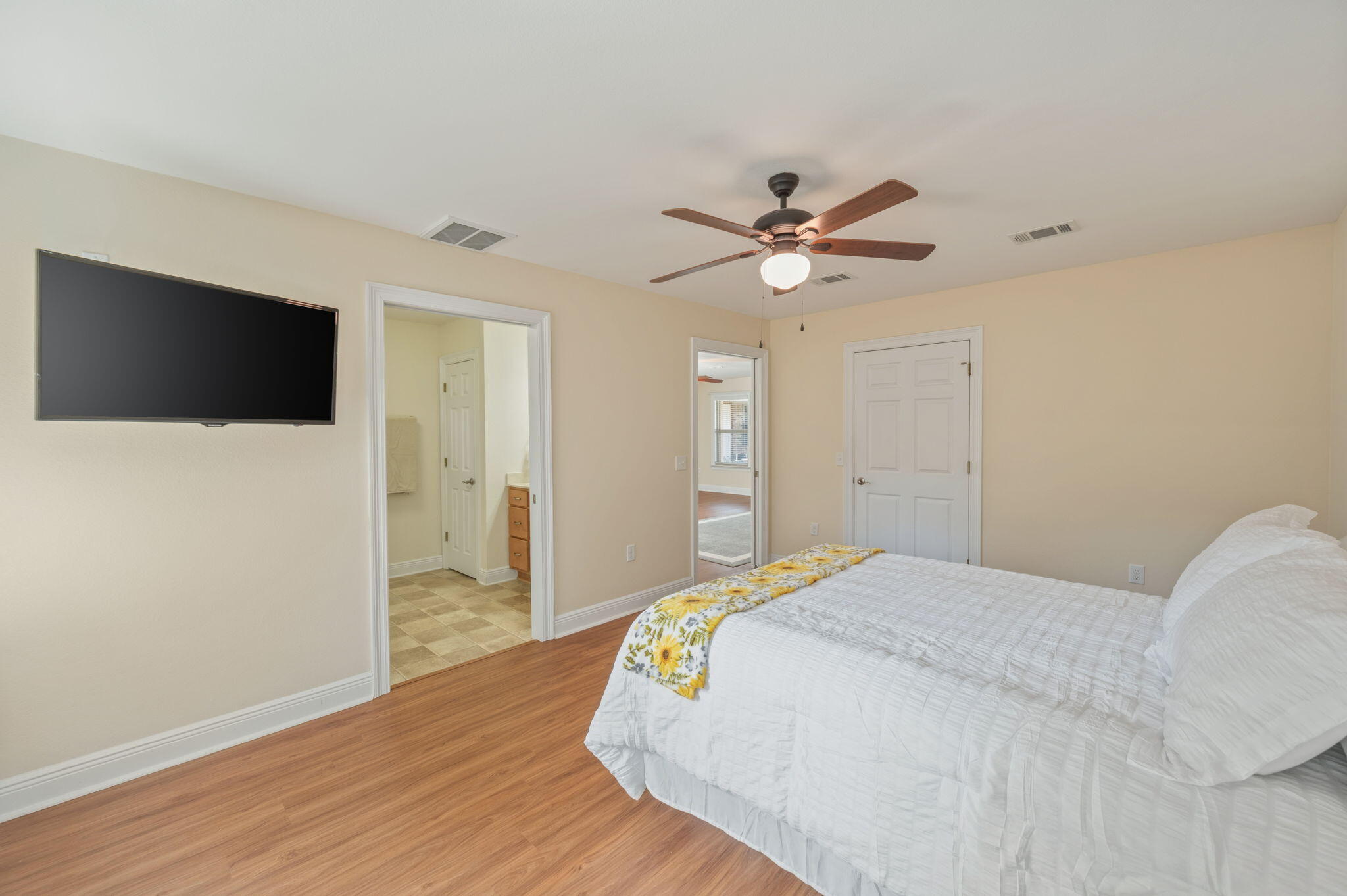 4841 Antioch Road Crestview, FL 32536 - Photo 58 of 70 a bedroom with a bed and a flat screen tv